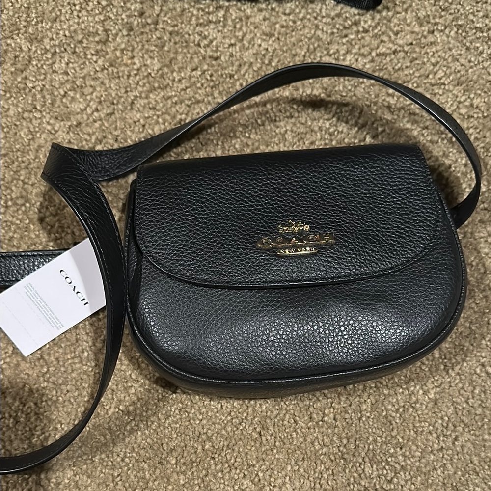 Hard to find. Black Leather Coach  belt Bag with Gold Hardware
